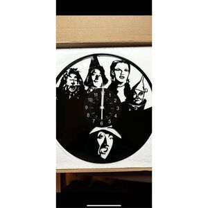The Wizard of Oz 12”Black Lp wall clock . Battery  operated .